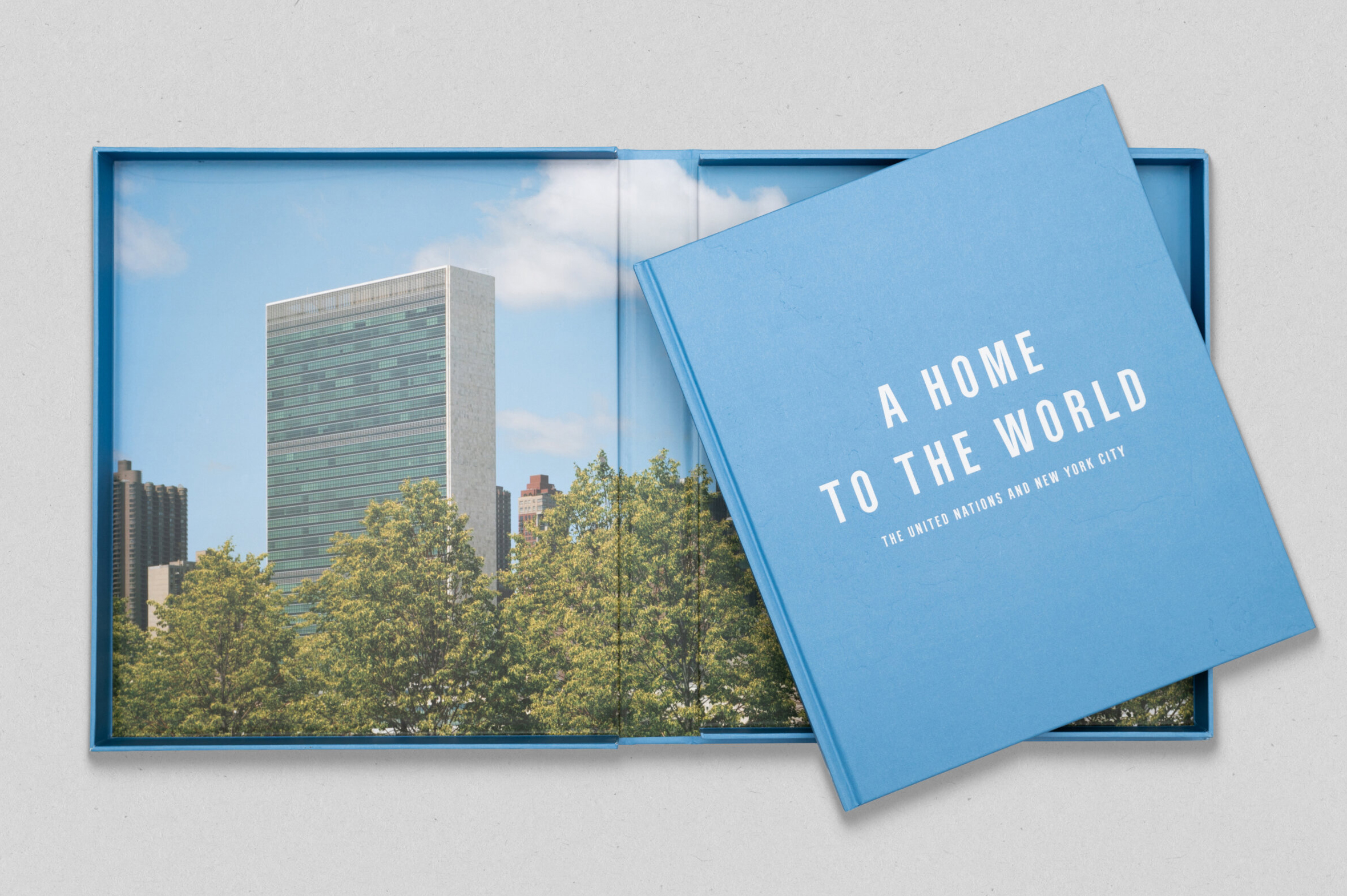 Front cover and decorative box for "A Home to the World: The United Nations and New York City"